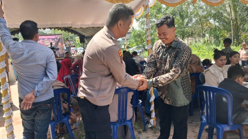 Polsek Rakumpit Kawal Resepsi Warga di Petuk Barunai, Situasi Berlangsung Kondusif